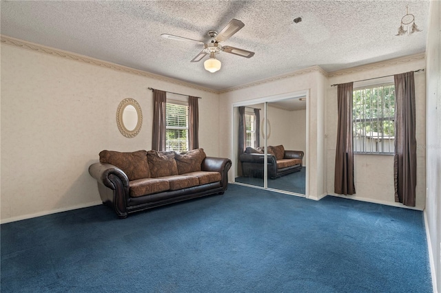206 N Dundee Way, Inverness, FL 34450 - living room with a ceiling fan, carpet floors, a textured ceiling, and crown molding