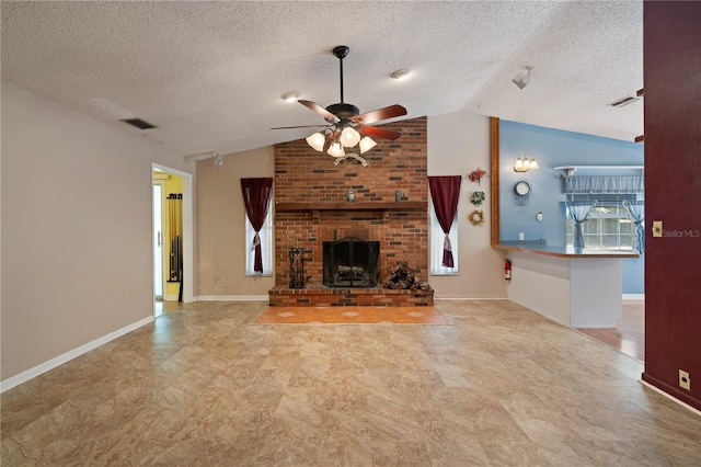 206 N Dundee Way, Inverness, FL 34450 - unfurnished living room featuring vaulted ceiling, ceiling fan, a textured ceiling, a fireplace, and tile patterned floors