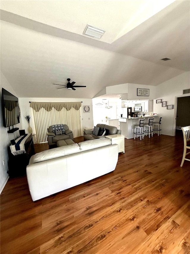 2550 SW Ivy Pl, Dunnellon, FL 34431 - living room featuring lofted ceiling, a ceiling fan, and wood finished floors