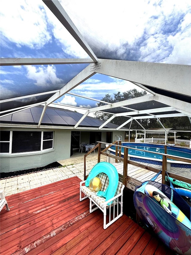 2550 SW Ivy Pl, Dunnellon, FL 34431 - deck with an outdoor pool, a patio area, and a lanai
