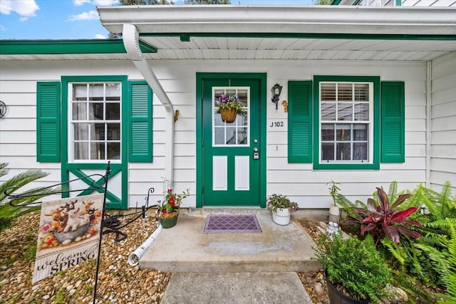 7961 Midway Drive Ter Unit J102, Ocala, FL 34472 - doorway to property with a porch