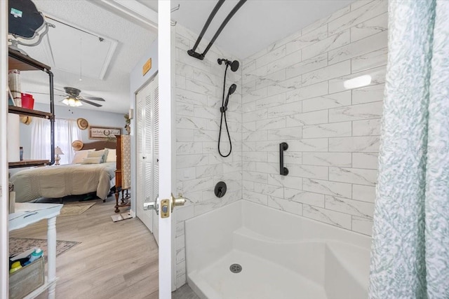 7961 Midway Drive Ter Unit J102, Ocala, FL 34472 - full bath featuring connected bathroom, shower / tub combo with curtain, and wood finished floors