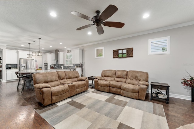 7839 SW 97th Cir, Ocala, FL 34481 - living room with recessed lighting, ceiling fan, ornamental molding, and dark wood-style floors
