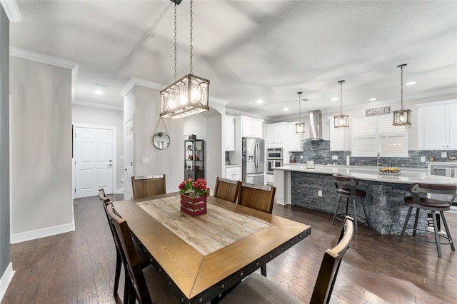7839 SW 97th Cir, Ocala, FL 34481 - dining space featuring dark wood-type flooring, crown molding, and recessed lighting