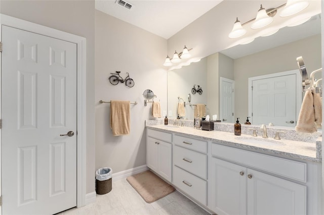 7839 SW 97th Cir, Ocala, FL 34481 - bathroom with double vanity and baseboards