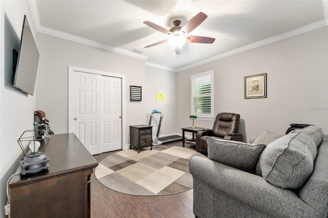 7839 SW 97th Cir, Ocala, FL 34481 - living room featuring a ceiling fan, ornamental molding, and wood finished floors
