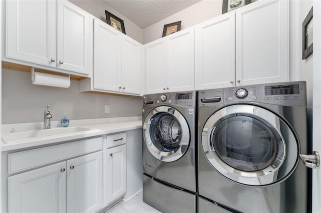 7839 SW 97th Cir, Ocala, FL 34481 - laundry area featuring cabinet space, separate washer and dryer, and a textured ceiling