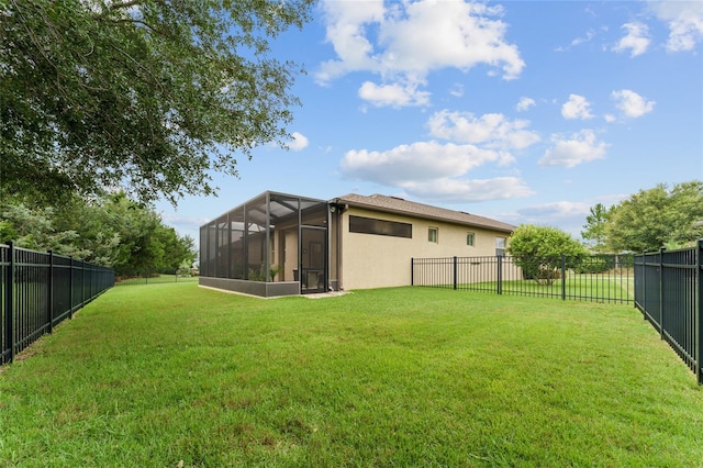 7839 SW 97th Cir, Ocala, FL 34481 - fenced backyard with a sunroom