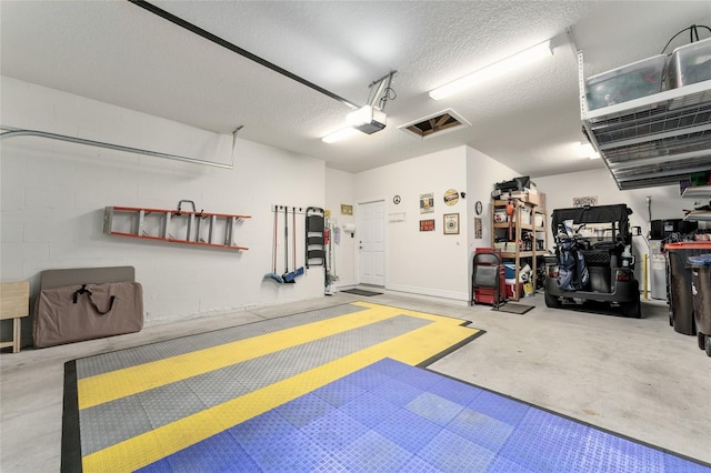 7839 SW 97th Cir, Ocala, FL 34481 - garage with a garage door opener and concrete block wall