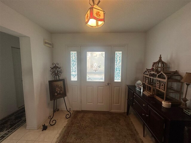 9730 SW 90th St, Ocala, FL 34481 - tiled foyer entrance with an AC wall unit