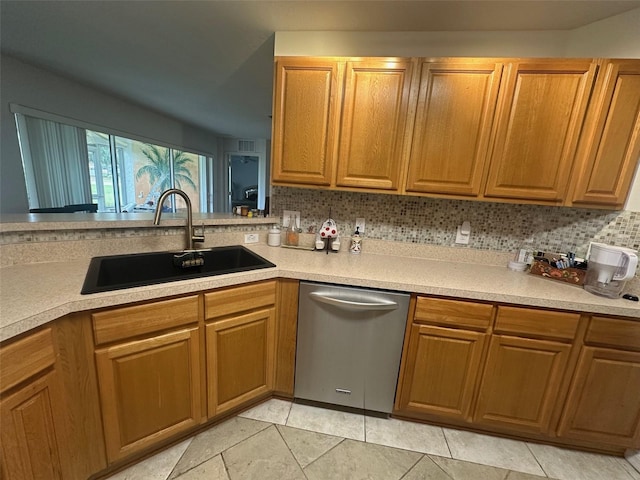 9730 SW 90th St, Ocala, FL 34481 - kitchen with dishwasher, light countertops, and brown cabinets