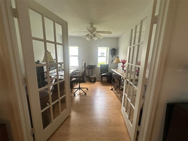 9730 SW 90th St, Ocala, FL 34481 - office with french doors, a textured ceiling, wood finished floors, and ceiling fan