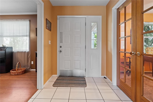 10230 289th St E, Myakka City, FL 34251 - foyer entrance featuring french doors, healthy amount of natural light, and light tile patterned floors