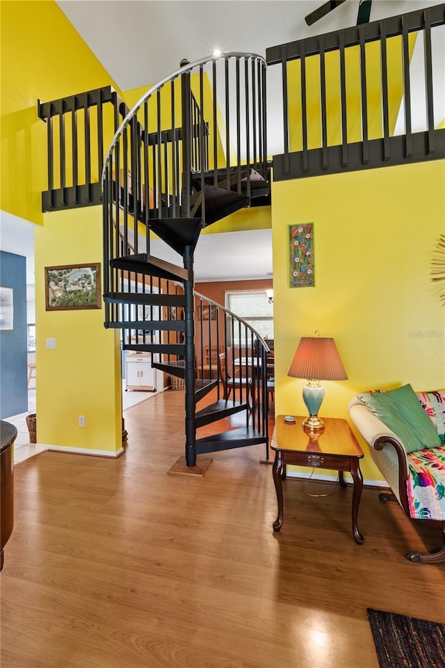 10230 289th St E, Myakka City, FL 34251 - stairway featuring a towering ceiling and wood finished floors