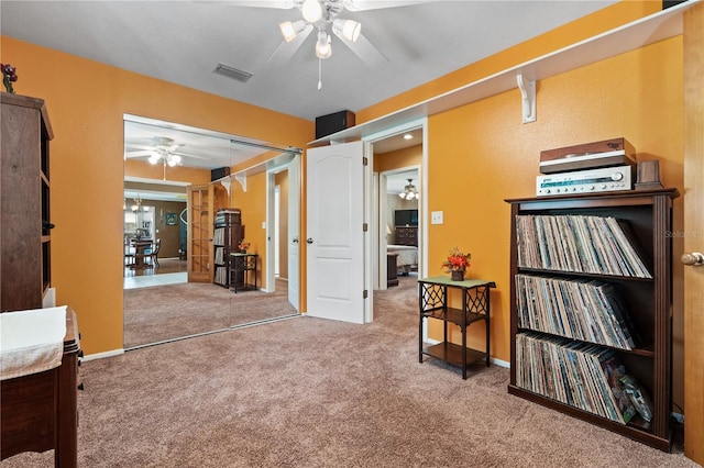 10230 289th St E, Myakka City, FL 34251 - bedroom with carpet floors, a closet, and a ceiling fan