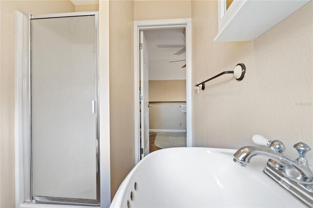 10230 289th St E, Myakka City, FL 34251 - bathroom featuring a shower stall and a freestanding bath