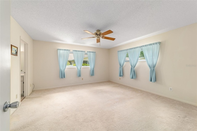 8704 SW 94th Ln Unit G, Ocala, FL 34481 - carpeted spare room featuring a ceiling fan and a textured ceiling