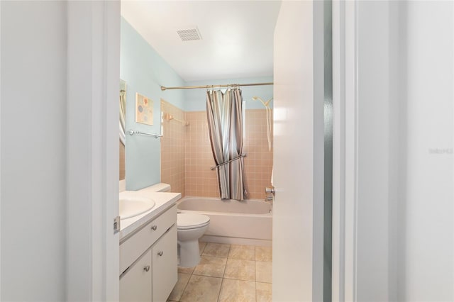 8704 SW 94th Ln Unit G, Ocala, FL 34481 - bathroom featuring vanity, shower / tub combo, and tile patterned floors