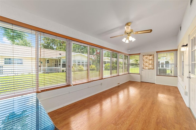 8704 SW 94th Ln Unit G, Ocala, FL 34481 - unfurnished sunroom featuring wood finished floors and lofted ceiling