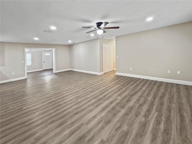 5 Bahia Circle Pl, Ocala, FL 34472 - unfurnished living room with a ceiling fan, recessed lighting, and dark wood-style floors