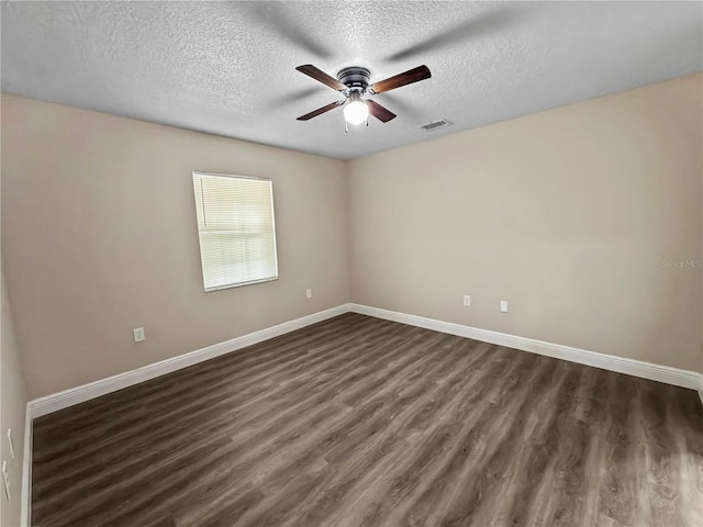 5 Bahia Circle Pl, Ocala, FL 34472 - empty room with a ceiling fan, dark wood-style floors, and a textured ceiling
