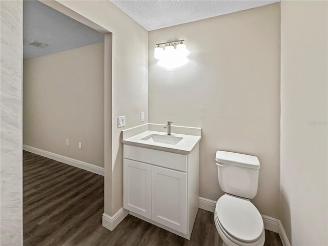 5 Bahia Circle Pl, Ocala, FL 34472 - bathroom with wood finished floors, vanity, and a textured ceiling