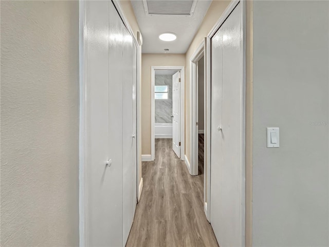 5 Bahia Circle Pl, Ocala, FL 34472 - hall with light wood-style flooring and baseboards