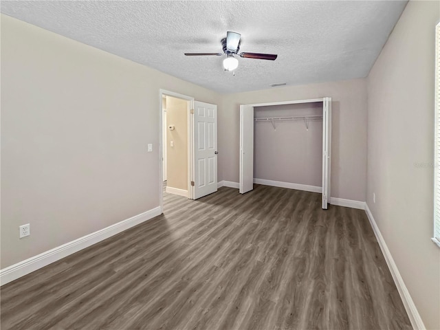 5 Bahia Circle Pl, Ocala, FL 34472 - unfurnished bedroom featuring wood finished floors, a textured ceiling, a closet, and a ceiling fan