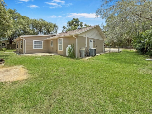 5 Bahia Circle Pl, Ocala, FL 34472 - rear view of house featuring a patio and stucco siding