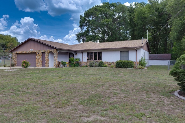 3427 SE 137th St, Summerfield, FL 34491 - ranch-style home featuring stone siding, stucco siding, a garage, and driveway