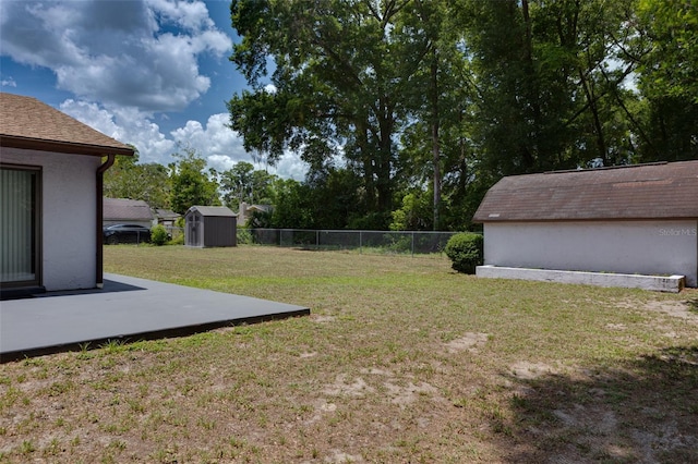 3427 SE 137th St, Summerfield, FL 34491 - fenced backyard featuring a shed and a patio