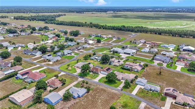 9641 SE 70th Ter, Ocala, FL 34472 - aerial view of property and surrounding area featuring nearby suburban area