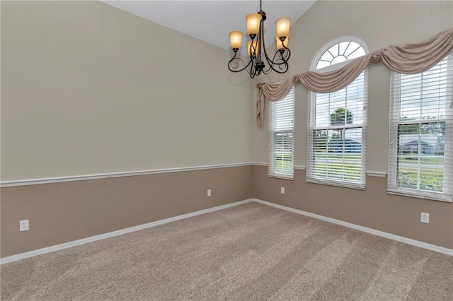 9641 SE 70th Ter, Ocala, FL 34472 - carpeted empty room featuring a chandelier and baseboards
