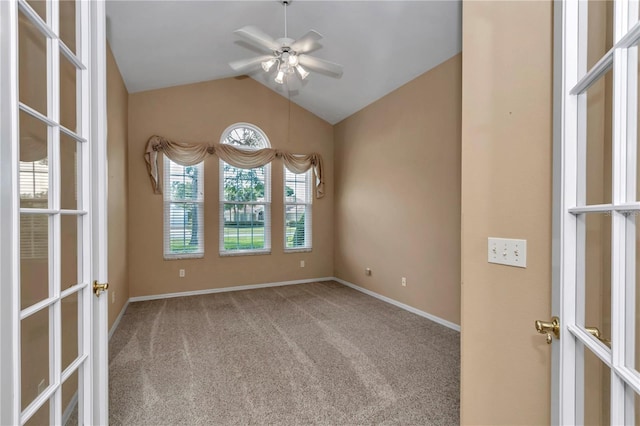 9641 SE 70th Ter, Ocala, FL 34472 - carpeted empty room featuring vaulted ceiling, ceiling fan, and french doors