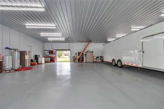 9641 SE 70th Ter, Ocala, FL 34472 - garage featuring electric water heater