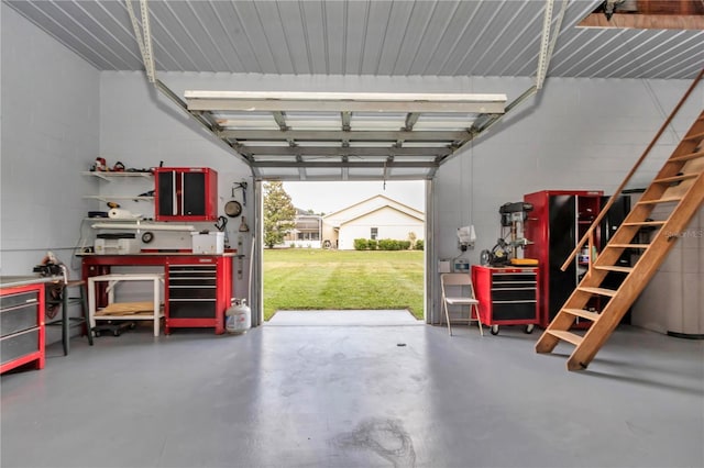 9641 SE 70th Ter, Ocala, FL 34472 - garage with a workshop area and concrete block wall