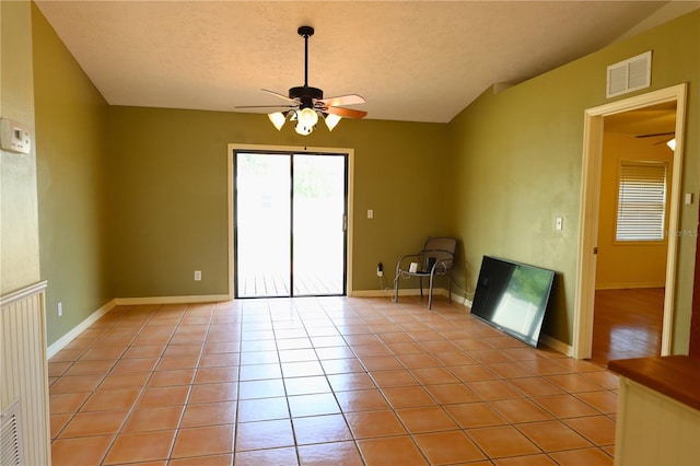7 Pecan Drive Loop, Ocala, FL 34472 - unfurnished room with ceiling fan, light tile patterned flooring, and a textured ceiling