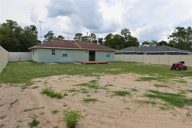7 Pecan Drive Loop, Ocala, FL 34472 - fenced backyard featuring a deck and a gate