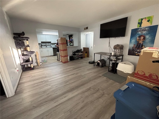 8134 Fairways Cir Unit R203, Ocala, FL 34472 - living room featuring light wood-style floors and baseboards