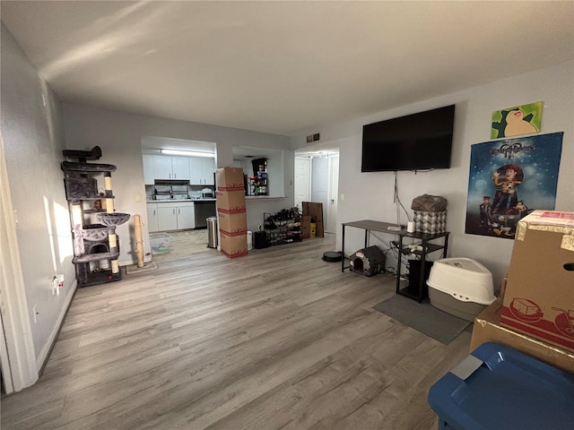 8134 Fairways Cir Unit R203, Ocala, FL 34472 - living area with light wood-type flooring and baseboards