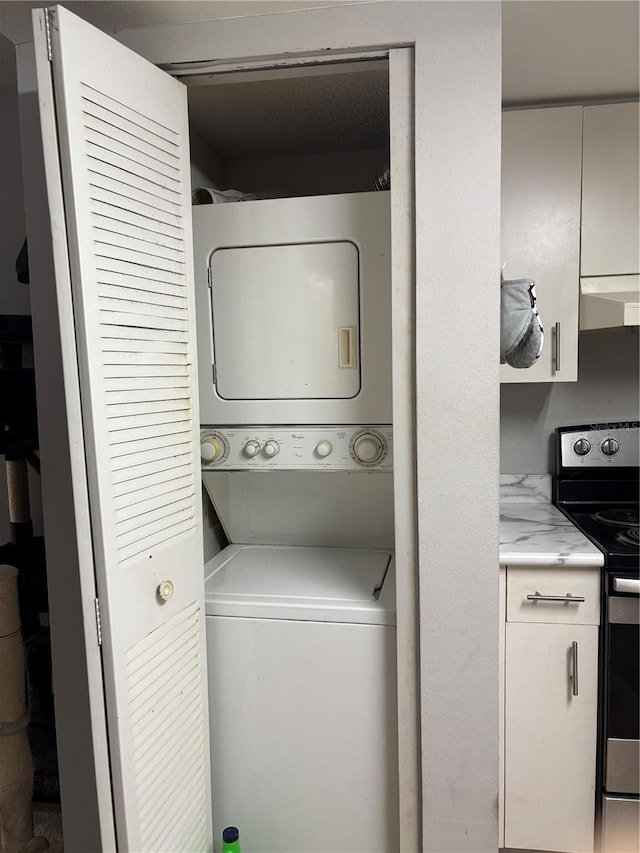 8134 Fairways Cir Unit R203, Ocala, FL 34472 - laundry area featuring stacked washer / dryer
