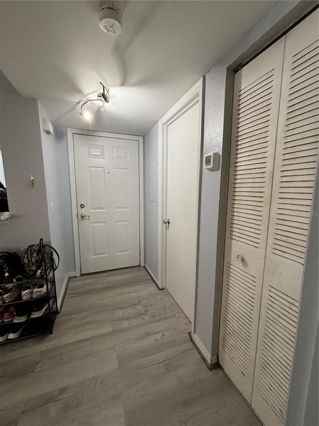 8134 Fairways Cir Unit R203, Ocala, FL 34472 - hall featuring light wood-style flooring and baseboards