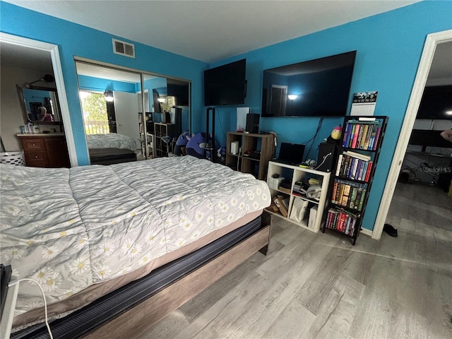 8134 Fairways Cir Unit R203, Ocala, FL 34472 - bedroom with wood finished floors and a closet