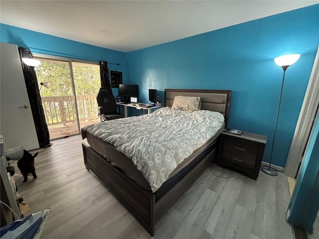 8134 Fairways Cir Unit R203, Ocala, FL 34472 - bedroom with access to outside and wood finished floors