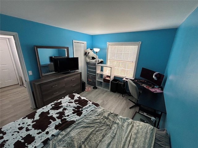 8134 Fairways Cir Unit R203, Ocala, FL 34472 - bedroom featuring light wood-type flooring, a closet, and a desk
