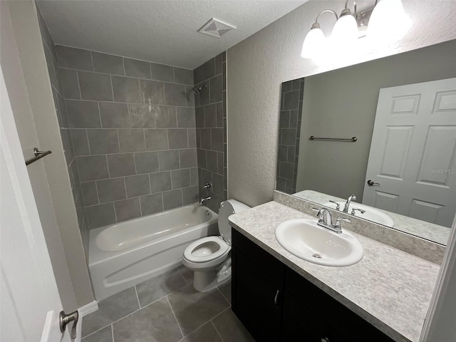 8795 Juniper Rd, Ocala, FL 34480 - full bathroom featuring a textured wall, a textured ceiling, vanity, bathing tub / shower combination, and tile patterned floors
