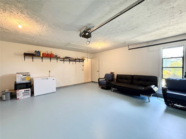 502 SE Guava Ter, Port St Lucie, FL 34983 - garage featuring refrigerator and a garage door opener