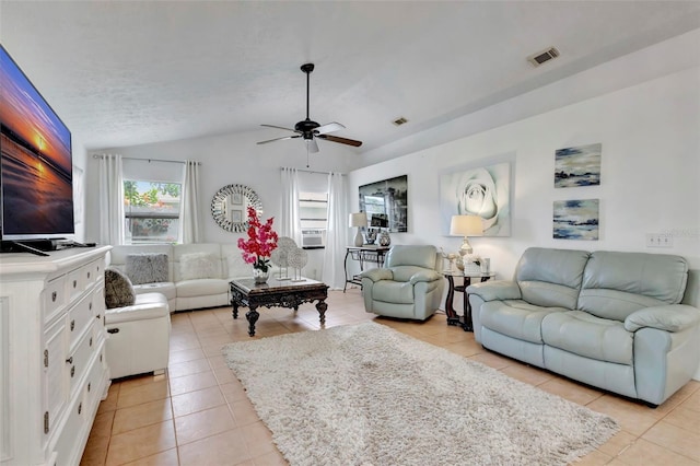 502 SE Guava Ter, Port St Lucie, FL 34983 - living room with light tile patterned floors, lofted ceiling, and a ceiling fan