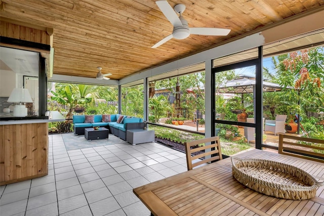 502 SE Guava Ter, Port St Lucie, FL 34983 - sunroom / solarium featuring a ceiling fan, an outdoor living space, and plenty of natural light