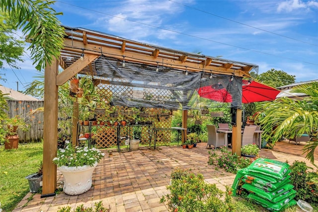 502 SE Guava Ter, Port St Lucie, FL 34983 - view of patio / terrace featuring a pergola